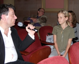 Mario Formenti, with Herbst<br>audience member Marina<br>Photo by Janos Gereben