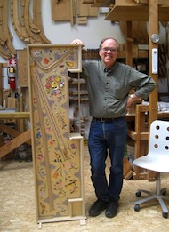 Phillips standing alongside the new muselaar that he's building