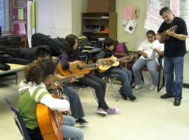 Cantare Teaching Artist Jorge Liceaga<br>teaching students the music of Mexico and Cuba<br>at Melrose Leadership Academy<br>a bilingual public school in Oakland