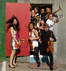 Magik*Magik Orchestra with Minna Choi (L), founding creative director<br>Photo by Robyn Twomey at Tiny Telephone Magik*Magik Orchestra founding creative director Photographed by Robyn Twomey at Tiny Telephone