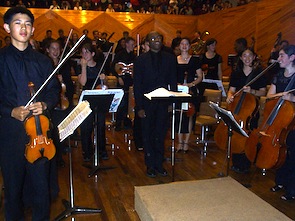 The Oakland Youth Orchestra and Michael Morgan take a bow The Oakland Youth Orchestra and Morgan take a bow
