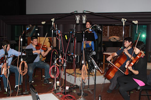 Ann Moss (center) with the Hausmann Quartet, on the sound stage at Skywalker Ranch<br>Photo by Jeff Kaliss Ann Moss (center) with the Hausmann Quartet, on the sound stage at Skywalker Ranch. Photo by Jeff Kaliss