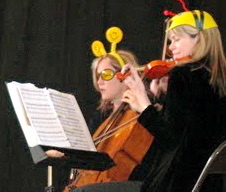 Elizabeth Vandervennet and Kerry Borgen of the Vallejo Trio Susan Sigge, flute; Elizabeth Vandervennet, cello; and Kerry Borgen, violin