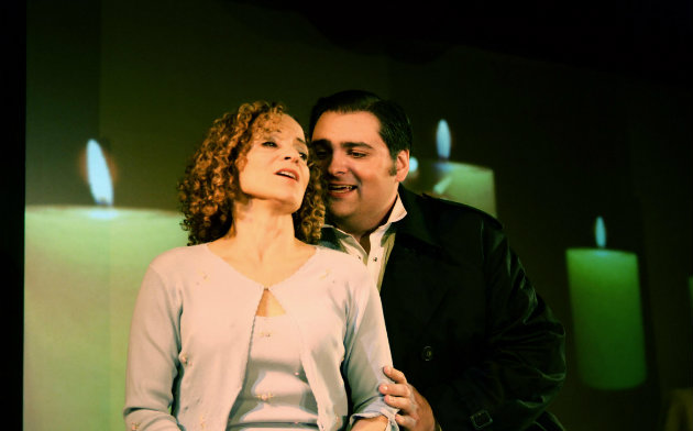 Gilda (Eileen Meredith) being seduced by the Duke of Mantua (Alex Boyer) (Photo by Craig Merrill)