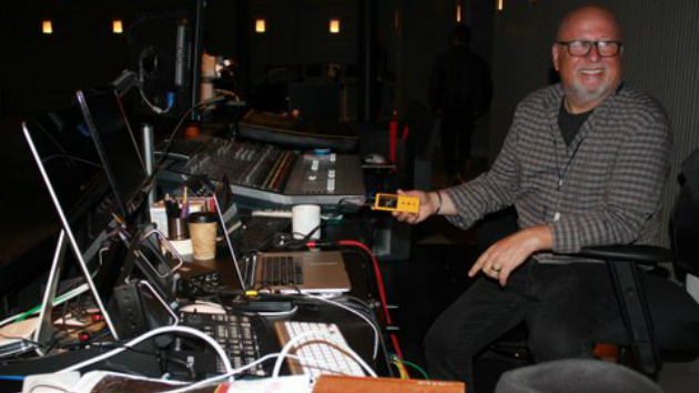 Acoustician Sam Berkow, in the sound booth at the SFJAZZ Center's Miner Auditorium, demonstrates the space's state-of-the-art acoustics. (Photo by Jeff Kaliss)