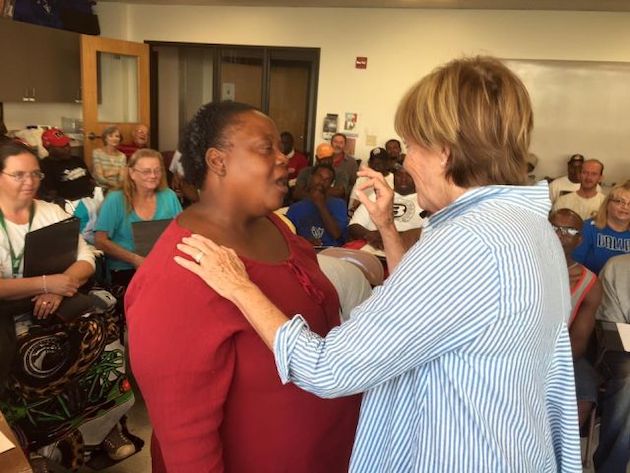 Flicka with a member of the Dallas Street Choir